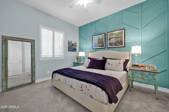 bedroom with ceiling fan and light carpet