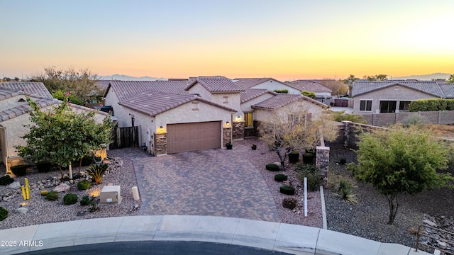 view of front of property featuring a garage