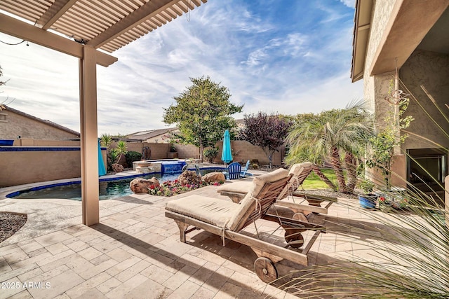 view of patio / terrace with a pool with hot tub and a pergola