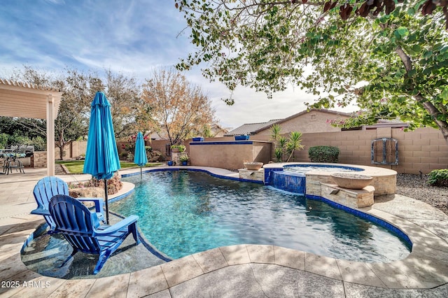 view of swimming pool with an in ground hot tub, pool water feature, and a patio