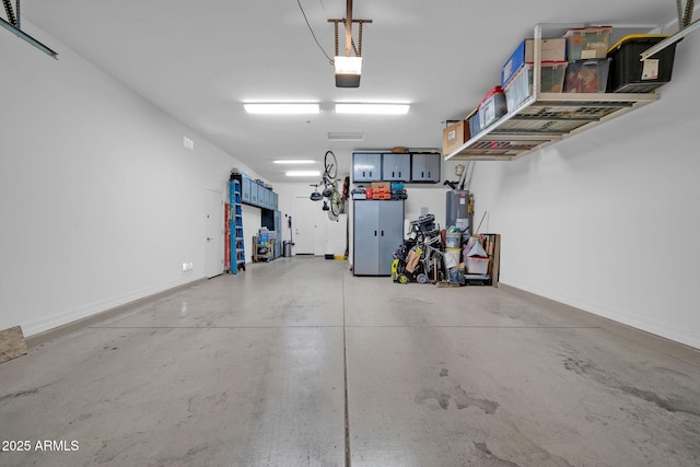 garage featuring a garage door opener and gas water heater