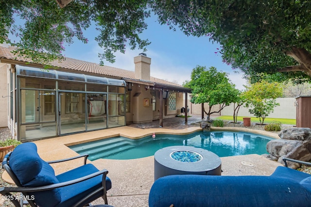 view of swimming pool featuring a patio area, a fenced backyard, and a fenced in pool