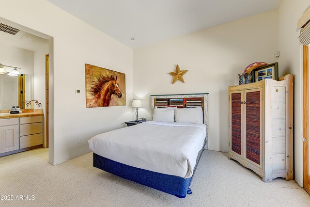 9415 N 124th St, Scottsdale, AZ 85259 - bedroom with light colored carpet and ensuite bathroom