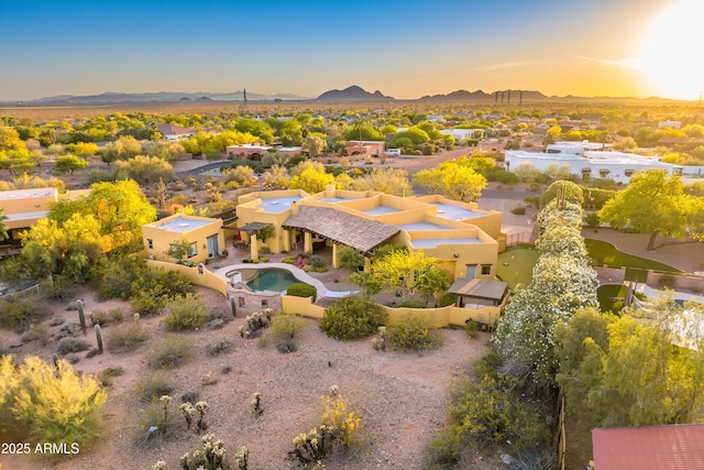 9415 N 124th St, Scottsdale, AZ 85259 - aerial view at dusk of a mountain view, view of pool, and a residential view
