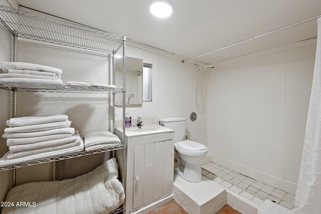 bathroom with a shower with shower curtain, tile patterned flooring, vanity, and toilet