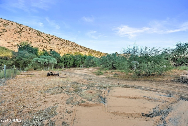 property view of mountains featuring a rural view