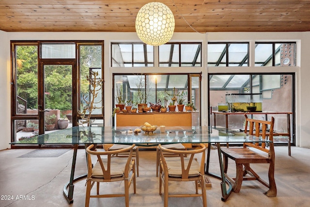 sunroom featuring wood ceiling