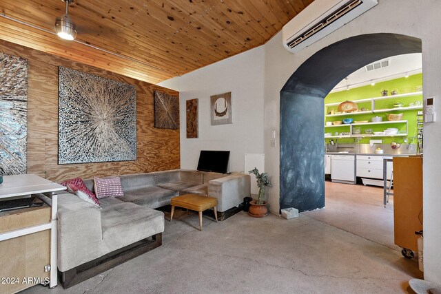 living room featuring wood ceiling, wood walls, and a wall mounted AC