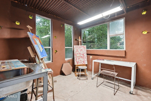 interior space with concrete floors and a wealth of natural light