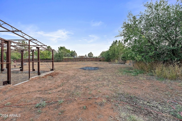 view of yard with a rural view