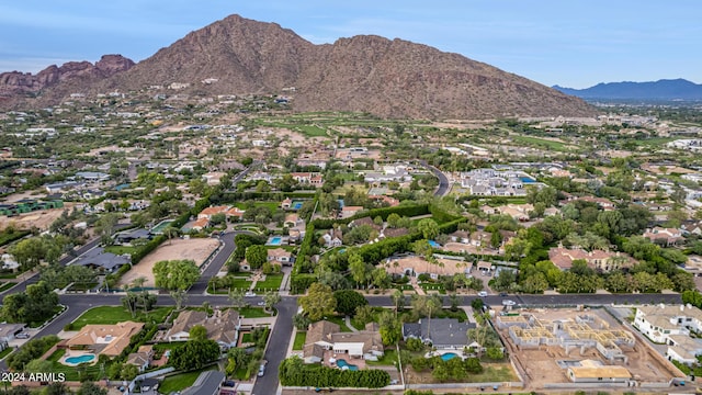 birds eye view of property featuring a mountain view and a residential view