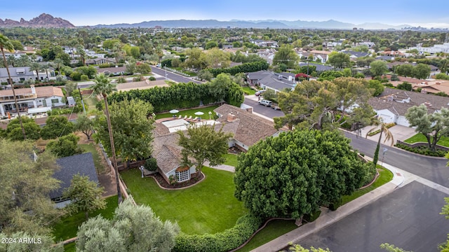 birds eye view of property featuring a residential view and a mountain view
