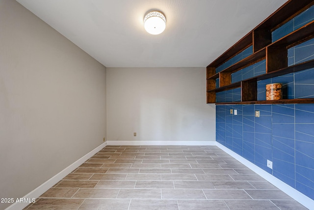 6533 N 7th Ave Unit 18, Phoenix, AZ 85013 - empty room with baseboards