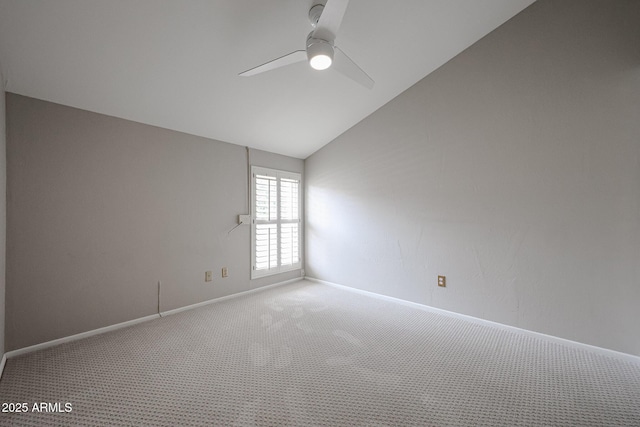 6533 N 7th Ave Unit 18, Phoenix, AZ 85013 - unfurnished room with carpet floors, ceiling fan, lofted ceiling, and baseboards