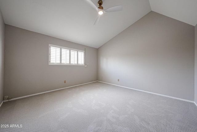 6533 N 7th Ave Unit 18, Phoenix, AZ 85013 - carpeted empty room featuring a ceiling fan, vaulted ceiling, and baseboards