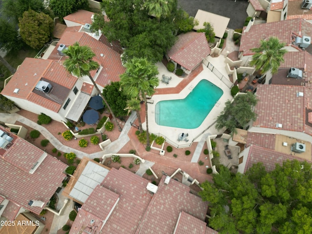6533 N 7th Ave Unit 18, Phoenix, AZ 85013 - aerial view of property and surrounding area featuring a pool and nearby suburban area