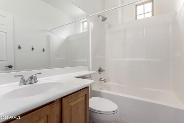 bathroom featuring toilet, vanity, and washtub / shower combination