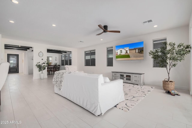 living room featuring ceiling fan