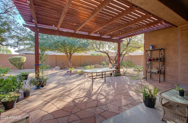 view of patio featuring a pergola