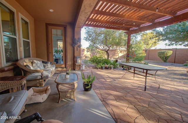 view of patio with an outdoor living space and a pergola