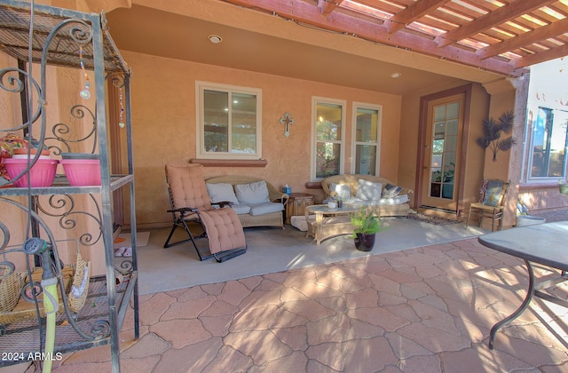 view of patio with a pergola and an outdoor living space