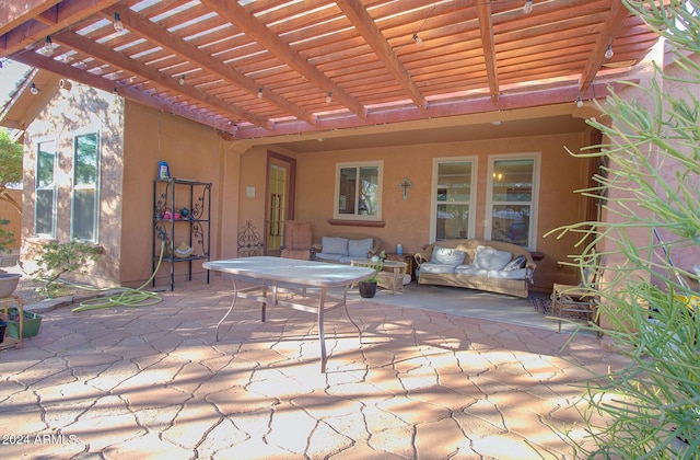 view of patio / terrace featuring outdoor lounge area and a pergola