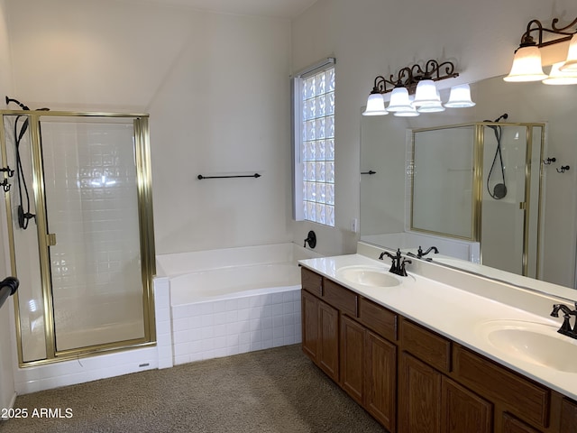 bathroom featuring vanity and separate shower and tub