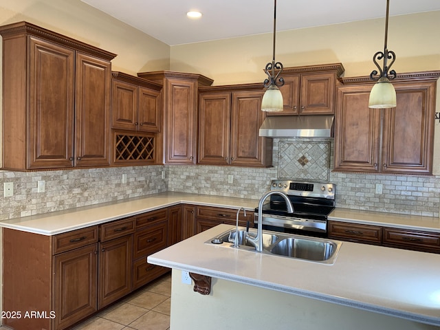 kitchen featuring stainless steel electric stove, pendant lighting, exhaust hood, and decorative backsplash