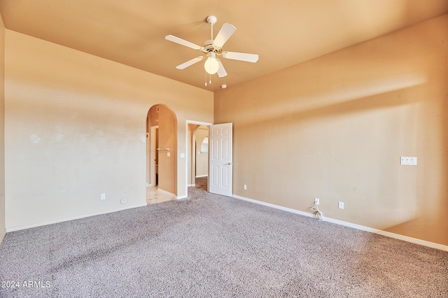 carpeted empty room with ceiling fan