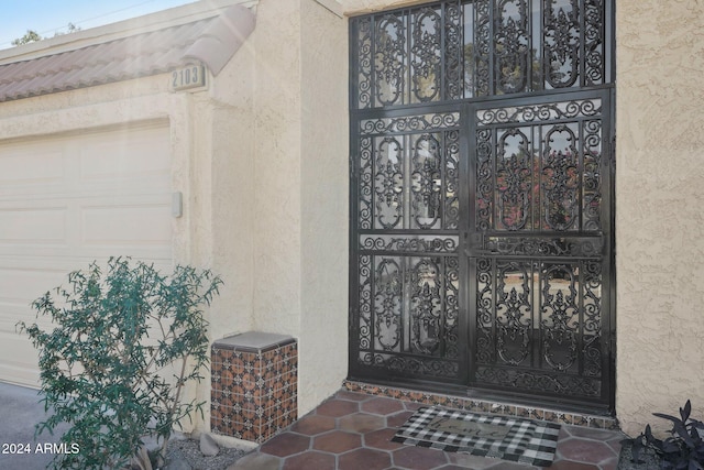 property entrance with a garage