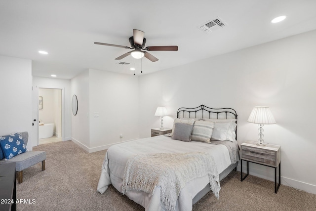 carpeted bedroom featuring ceiling fan and connected bathroom