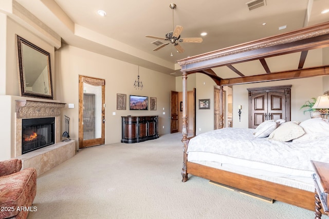 bedroom featuring recessed lighting, visible vents, decorative columns, a high end fireplace, and carpet