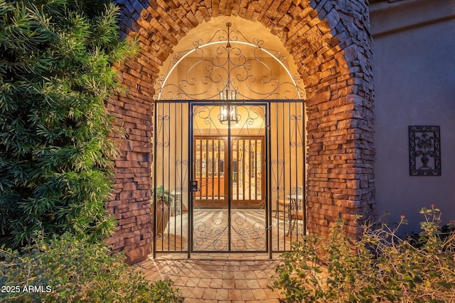 entrance to property featuring a gate