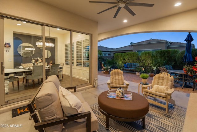 view of patio featuring outdoor lounge area, a ceiling fan, and outdoor dining space