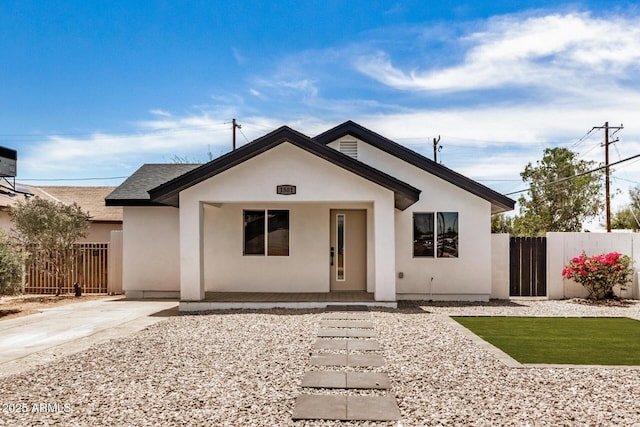 1501 E Sheridan St, Phoenix, AZ 85006 - view of front facade featuring stucco siding, covered porch, and a shingled roof