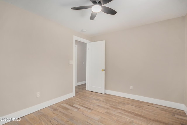 1501 E Sheridan St, Phoenix, AZ 85006 - unfurnished room featuring a ceiling fan, wood finished floors, and baseboards