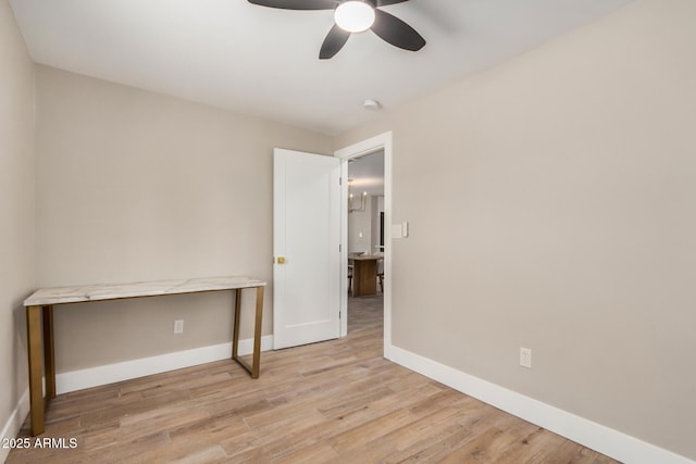 1501 E Sheridan St, Phoenix, AZ 85006 - unfurnished bedroom with baseboards, light wood-type flooring, and ceiling fan