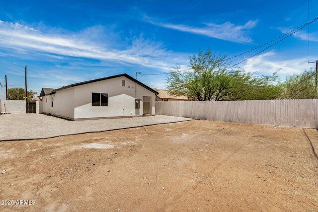 1501 E Sheridan St, Phoenix, AZ 85006 - back of property with a fenced backyard and stucco siding