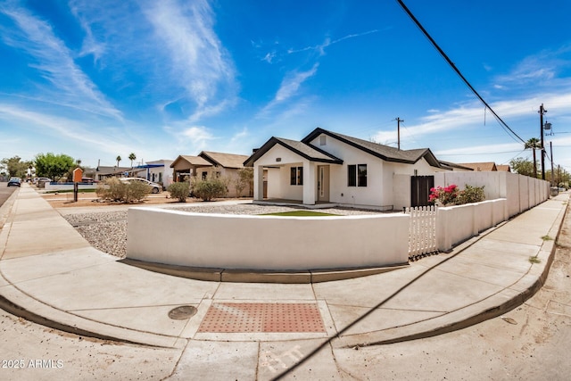 1501 E Sheridan St, Phoenix, AZ 85006 - modern farmhouse with a fenced front yard and stucco siding