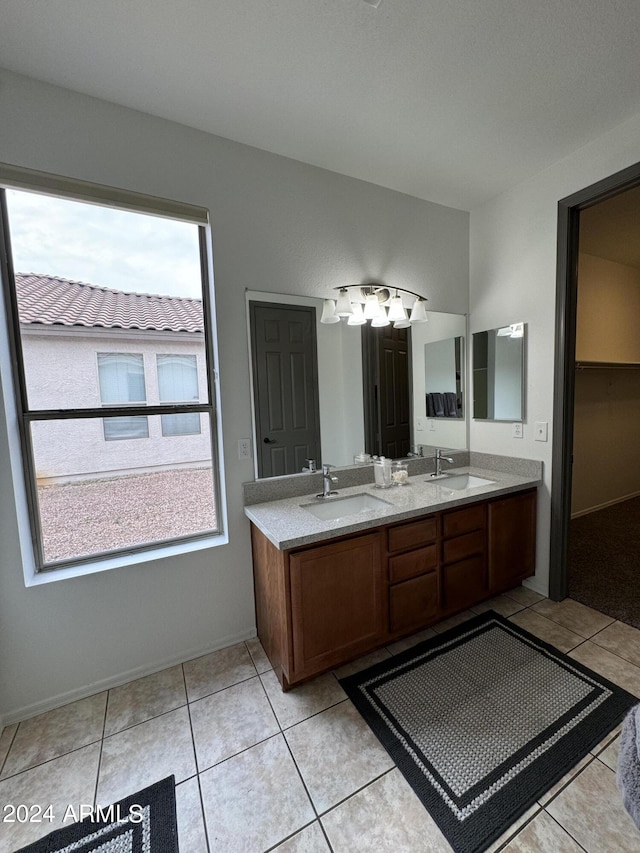 bathroom featuring vanity and tile patterned floors