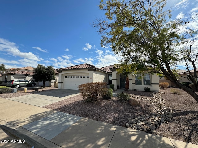 view of front of property featuring a garage