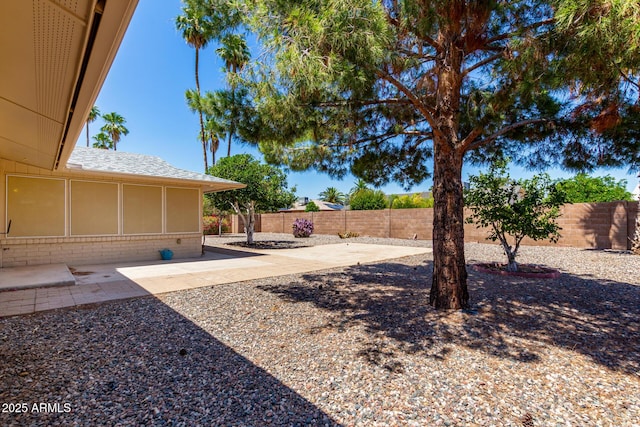 10126 W Sombrero Cir, Sun City, AZ 85373 - fenced backyard with a patio