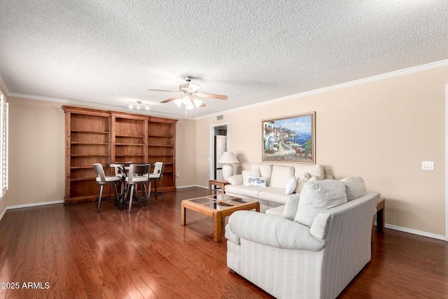 10126 W Sombrero Cir, Sun City, AZ 85373 - living area with a textured ceiling, ornamental molding, ceiling fan, baseboards, and wood finished floors