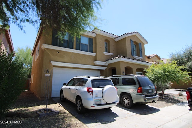 view of front of home with a garage