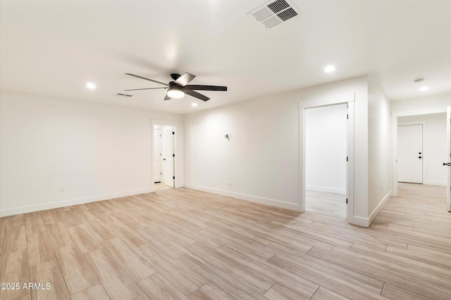 1801 E Berridge Ln, Phoenix, AZ 85016 - unfurnished room featuring ceiling fan, recessed lighting, light wood-style flooring, and baseboards