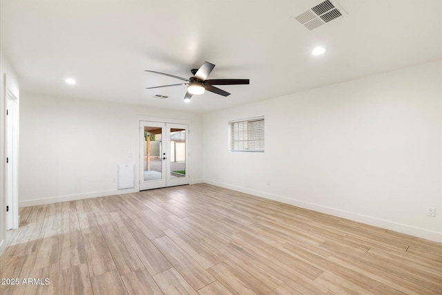 1801 E Berridge Ln, Phoenix, AZ 85016 - unfurnished room featuring a ceiling fan, light wood finished floors, baseboards, french doors, and recessed lighting