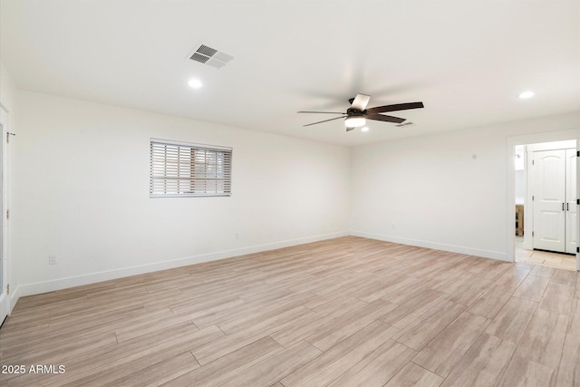 1801 E Berridge Ln, Phoenix, AZ 85016 - spare room featuring ceiling fan, light wood-type flooring, baseboards, and recessed lighting