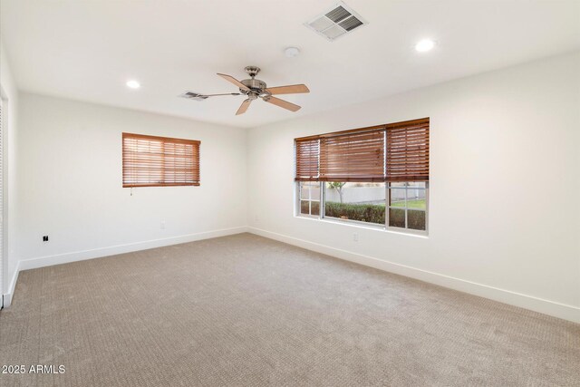 1801 E Berridge Ln, Phoenix, AZ 85016 - spare room with baseboards, light colored carpet, a ceiling fan, and recessed lighting