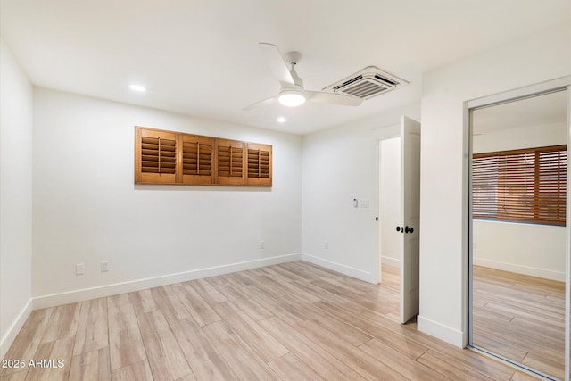 1801 E Berridge Ln, Phoenix, AZ 85016 - unfurnished bedroom with light wood-style flooring, recessed lighting, baseboards, and ceiling fan