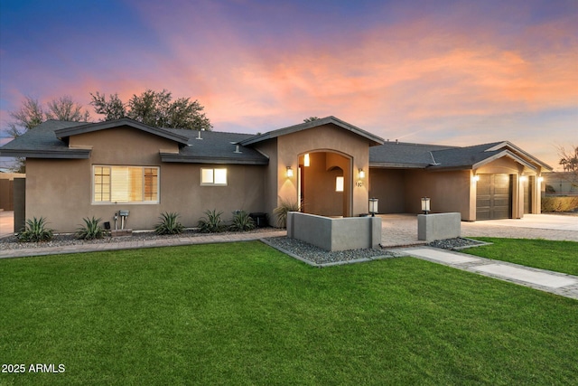 1801 E Berridge Ln, Phoenix, AZ 85016 - ranch-style house featuring concrete driveway, a garage, stucco siding, and a front lawn